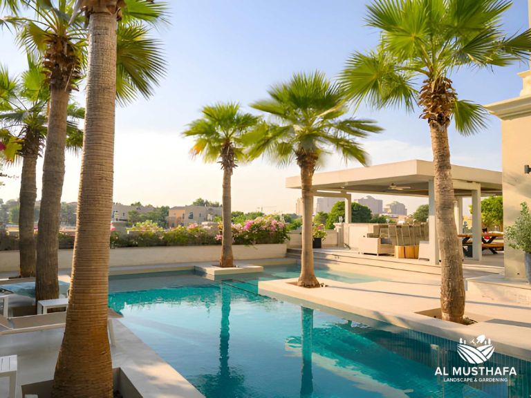 custom pergola rooftop Dubai louvered poolside villa evening