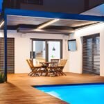 modern aluminium pergola villa Dubai poolside evening